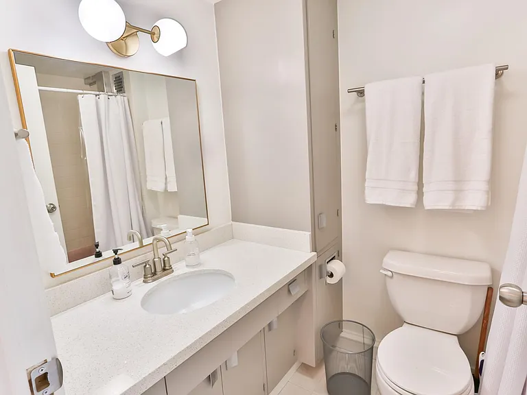The bathroom also features updated cabinets and counters, and packs a punch of charm and character for its size.