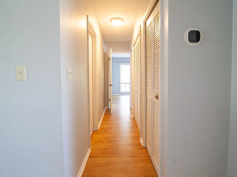 Hallway to the main bedroom, 2nd guest room and 2 bathrooms.