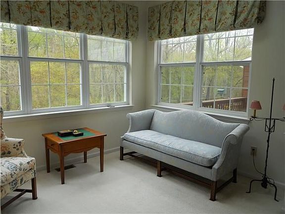 Sunroom has Two Skylights and Wooded Views