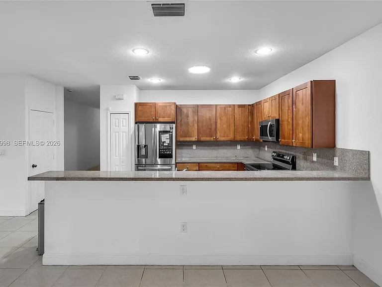 9925 NW 10th St — Photo 12