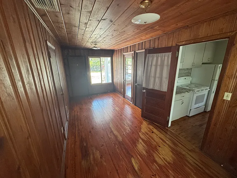 Beautiful tongue and groove wood paneled room/ breezeway