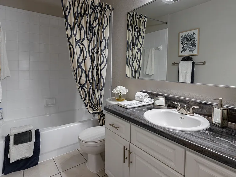 Experience contemporary luxury in our brilliantly updated bathrooms, offering refined elegance and sleek design.