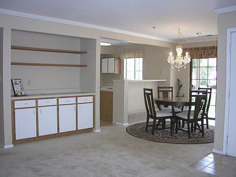 Sunny Dining Room with Doors to Patio