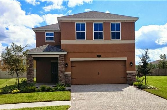 Two-story Savannah home with paver drive