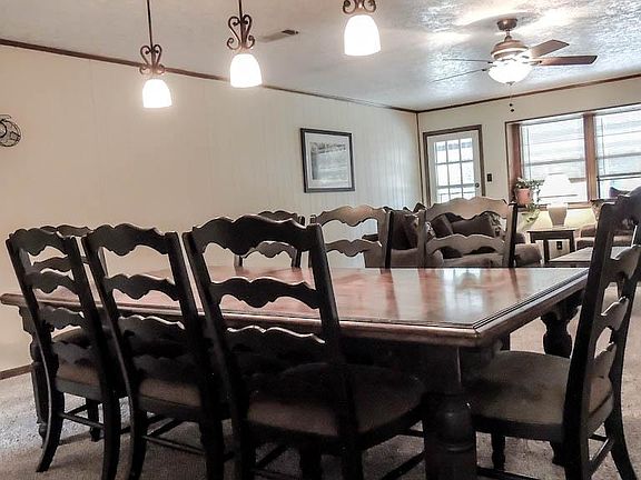 Dining area accommodatesbig dining room furniture.