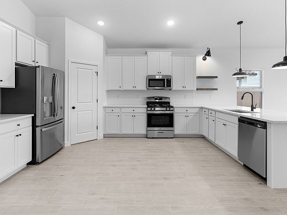Kitchen with stainless steel appliances