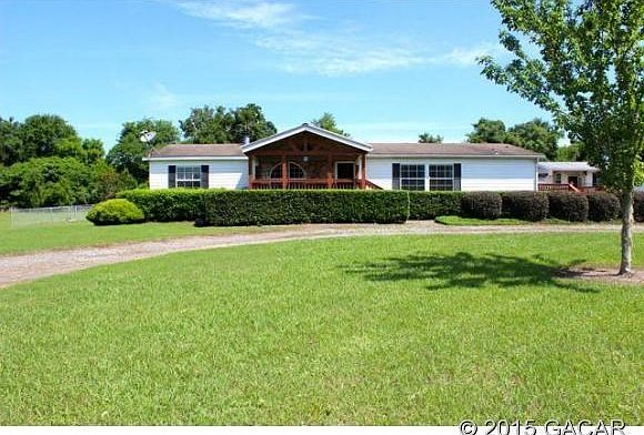 LOVELY HOME ON 5 ACRES
