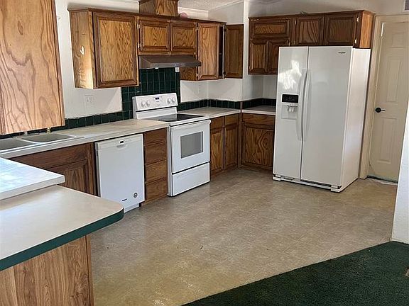 3rd image of 10903 E Lone Chimney Rd