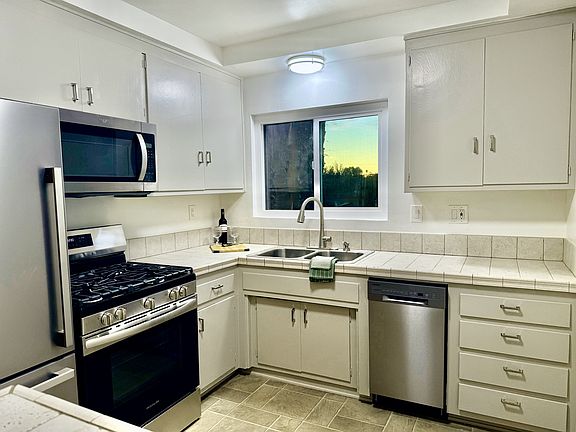 Bright Kitchen with Brand New Premium Stainless Steel Appliances, French Door Fridge~