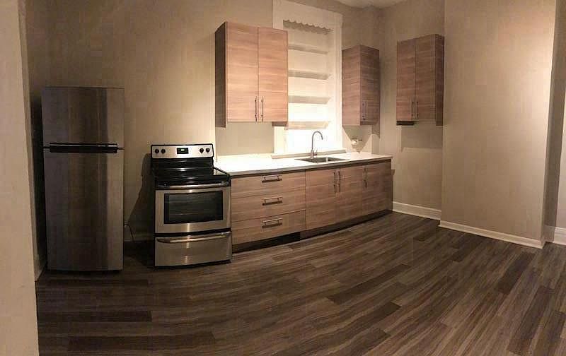brand new Ikea kitchen and flooring (stove not pictured yet)