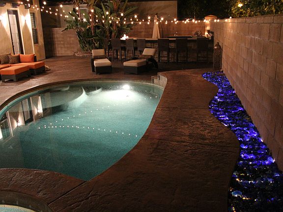 pool and lit glass rock rive