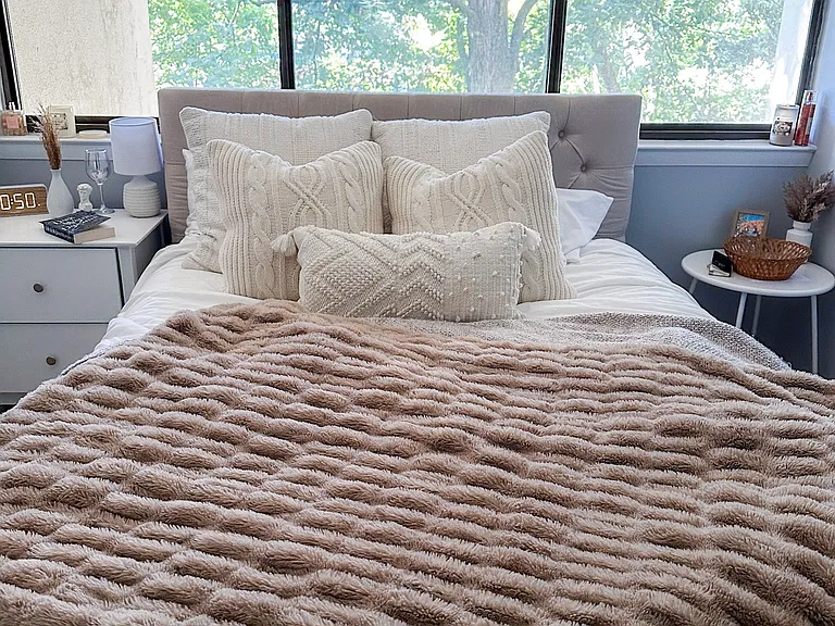 Bedroom #2 with large closet and windows with view overlooking the woods