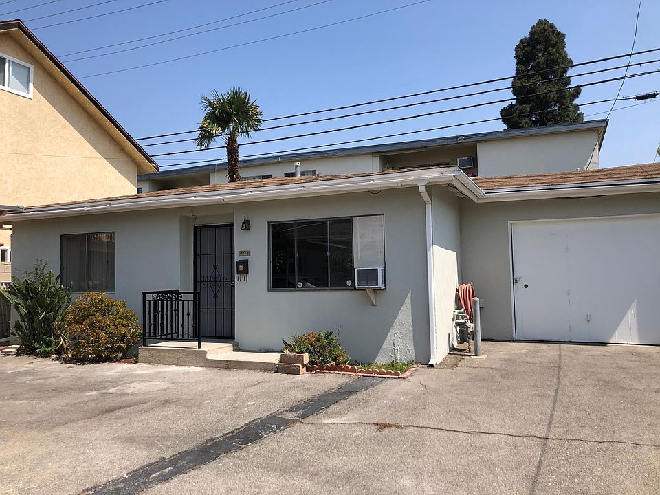 Front of house + garage space