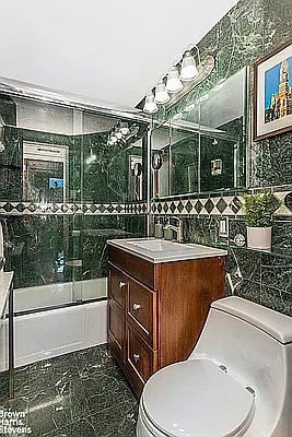 5th image of 410 W 23rd St APT 3A