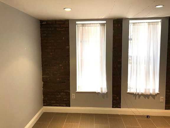 5th image of 27 E 7th St APT 1W