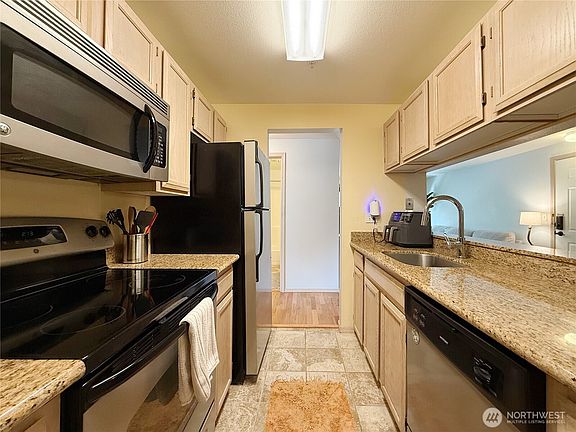 5th image of 12050 15th Avenue NE #301