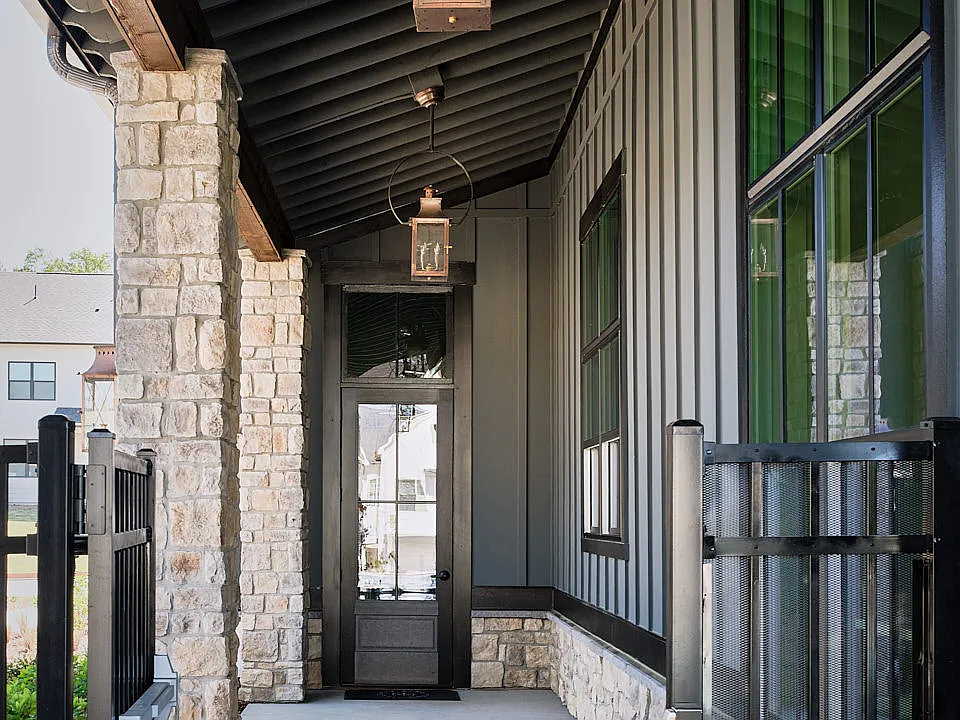 Front porch of the Clubhouse featuring a black ceiling and inviting entryway.