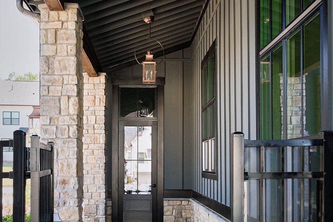Front porch of the Clubhouse featuring a black ceiling and inviting entryway.