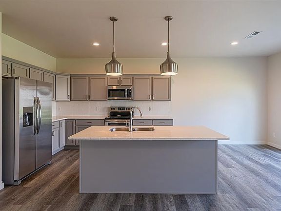 Beautiful kitchen with new appliances and island