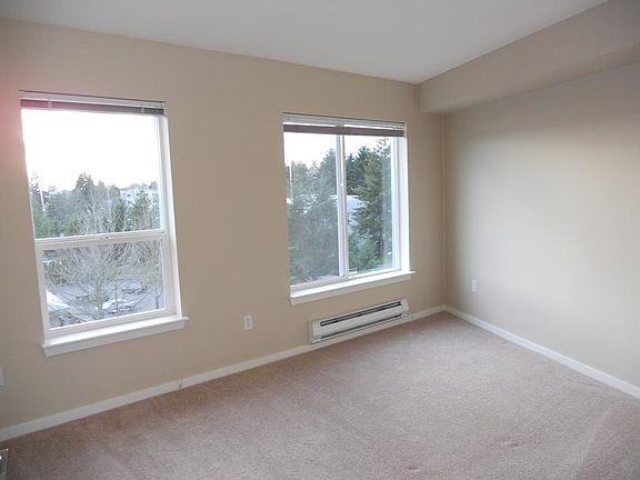 Bright master bedroom w/ a beautiful view of DT Kirkland