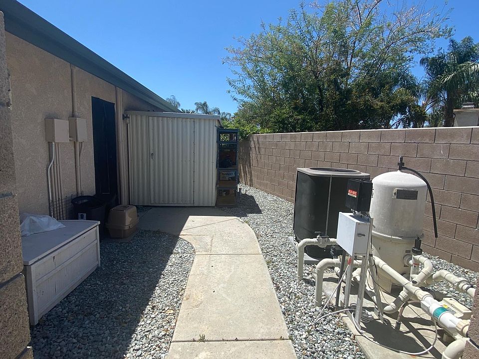 Private backyard for use. (Main occupants need access to pool equipment and shed as needed)