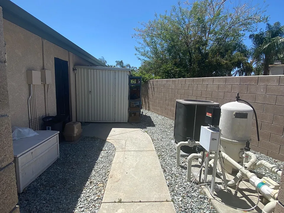Private backyard for use. (Main occupants need access to pool equipment and shed as needed)