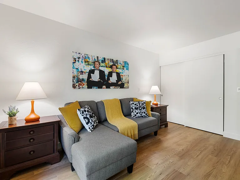 Bedroom 3 includes a full closet and a double sofa bed, with direct access to the backyard for serene views and convenient trail access.
