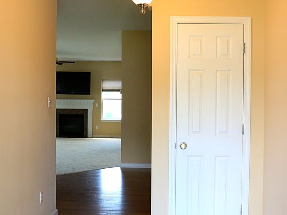 Welcoming Foyer with Wood Fl