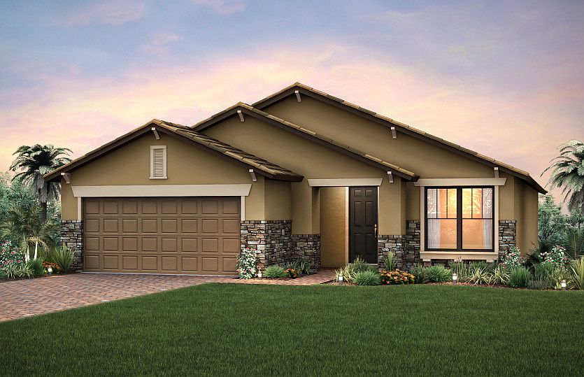 Home Exterior C2B with decorative brick paver driveway