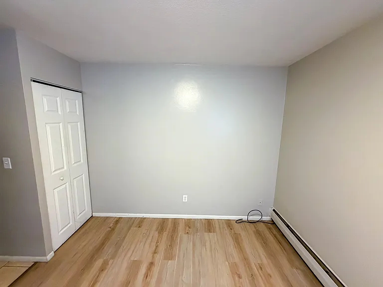 Second closet in primary. Same size closet on other side of doorway.