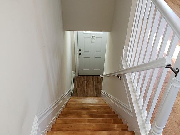 Vestibule and steps into apartment