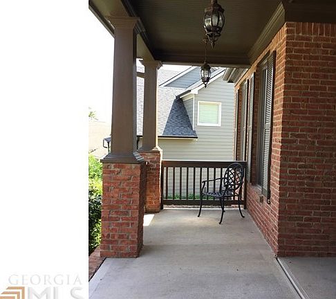 Relax your cares away on this front porch at the end of the day