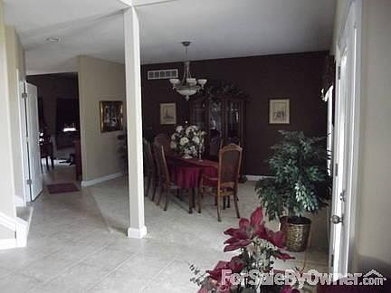 Upper Foyer
						:
						Two of bedrooms are visible.