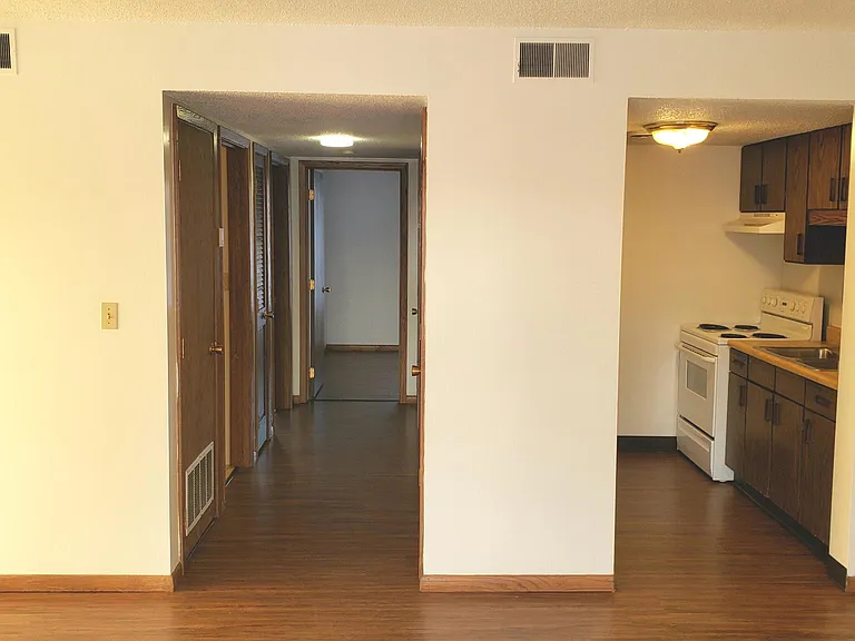 Hard flooring throughout with tile in bathroom