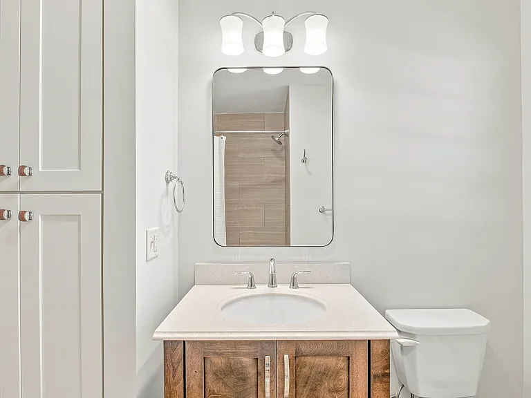 Main level bath - modern lighting and fixtures