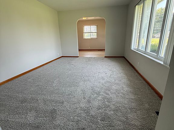 View of living room from entry way, looking towards the dining room.