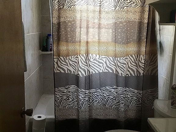 Bathroom with full bathtub