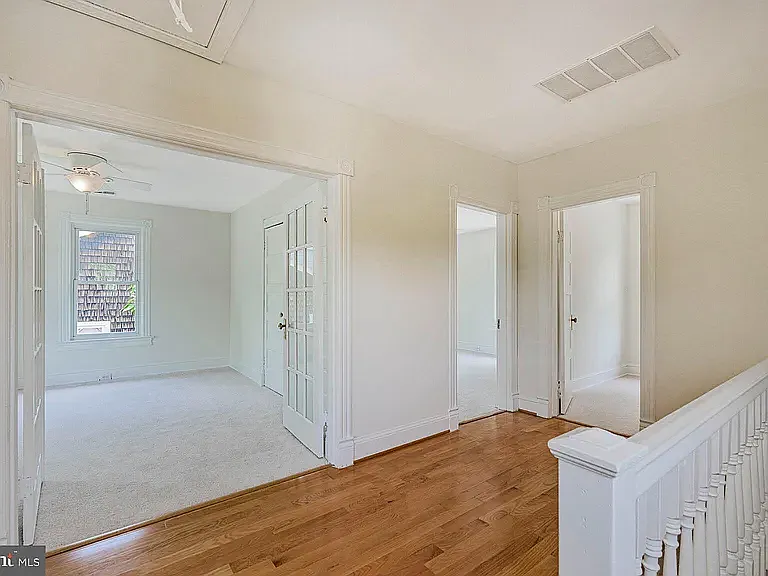 Upstairs landing with hardwood floors - lots of natural light