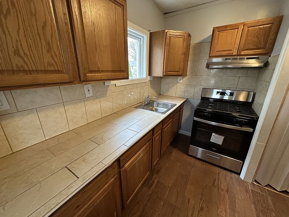 Kitchen ceramic tiled, new gas range & oven, walk-in pantry (to the right, not pictured)