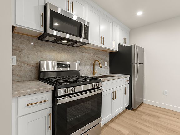 2nd image of 8759 Snowden Ave #1/2