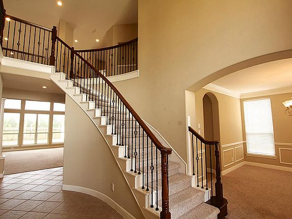 IRON SPINDLES, SOARING TWO STORY CEILINGS