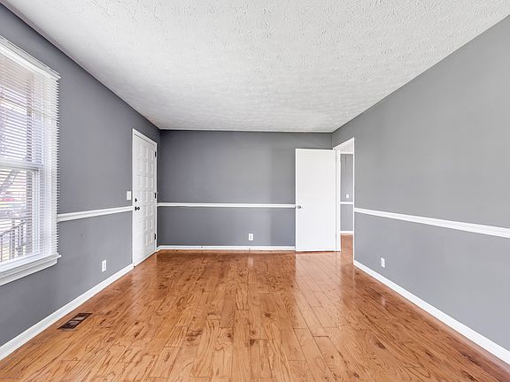 Dining room with door to the Living Room (pictured on the right side)