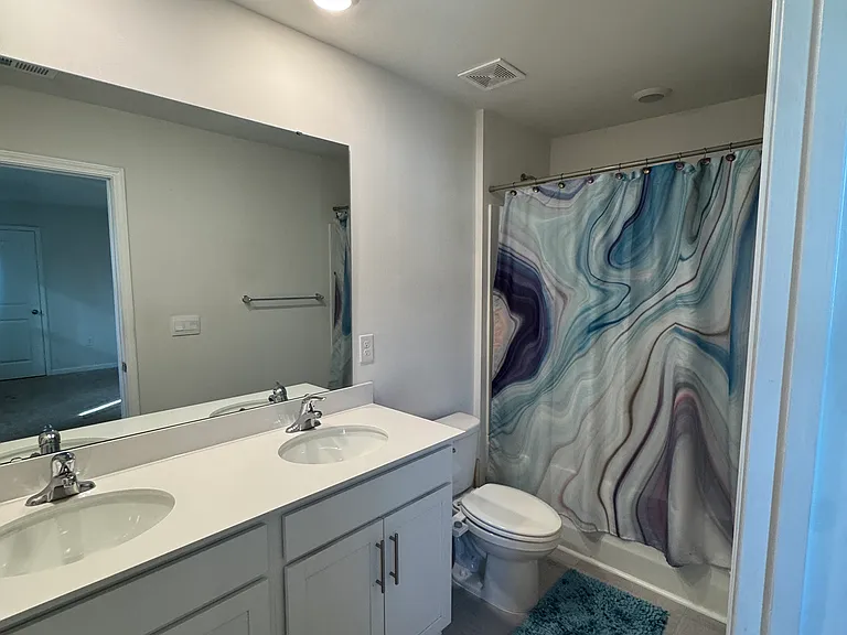 Bathroom with shower and tub
