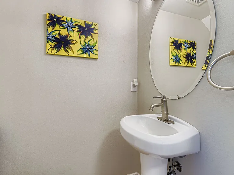 1/2 bathroom downstairs with bidet attachment in toilet