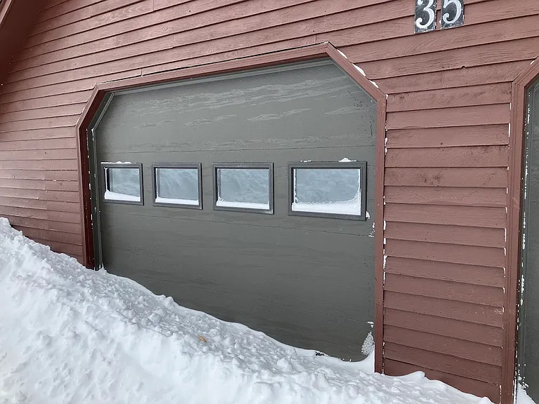 front of garage in winter