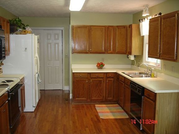 Kitchen offers lots of cabinet, counter, and pantry space.