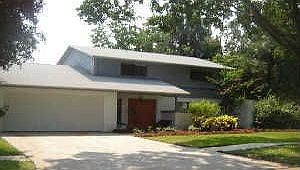 Charming 4/2.5/2 home on large corner lot. This home is move in ready.