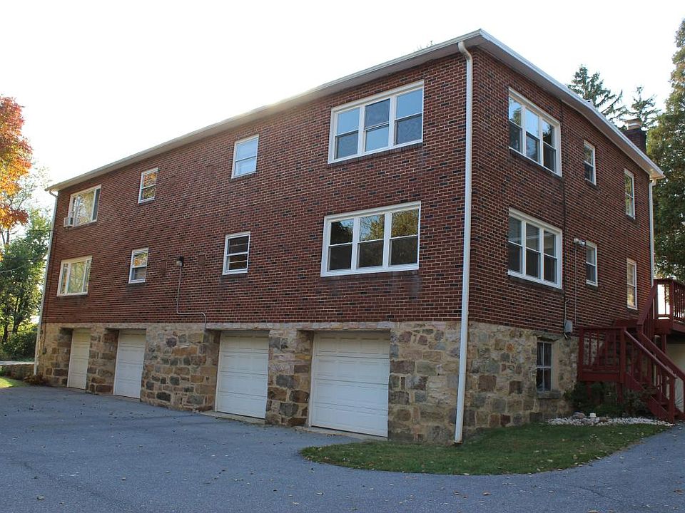 Apartment Unit is on the right above garage.