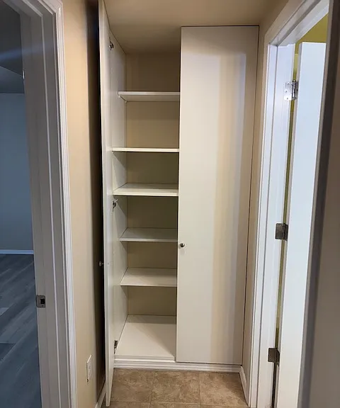 Hall Closet between Bedroom/Bathroom
