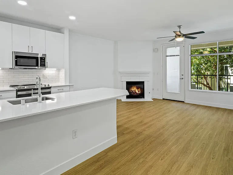 Living Room with Fireplace and Hard Surface Flooring